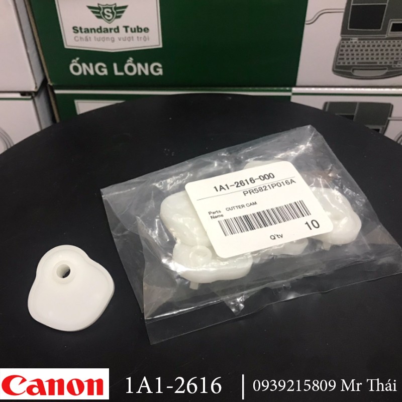 Camshaft of Canon 1A1-2616 tube printer with white color is used with a cutting knife